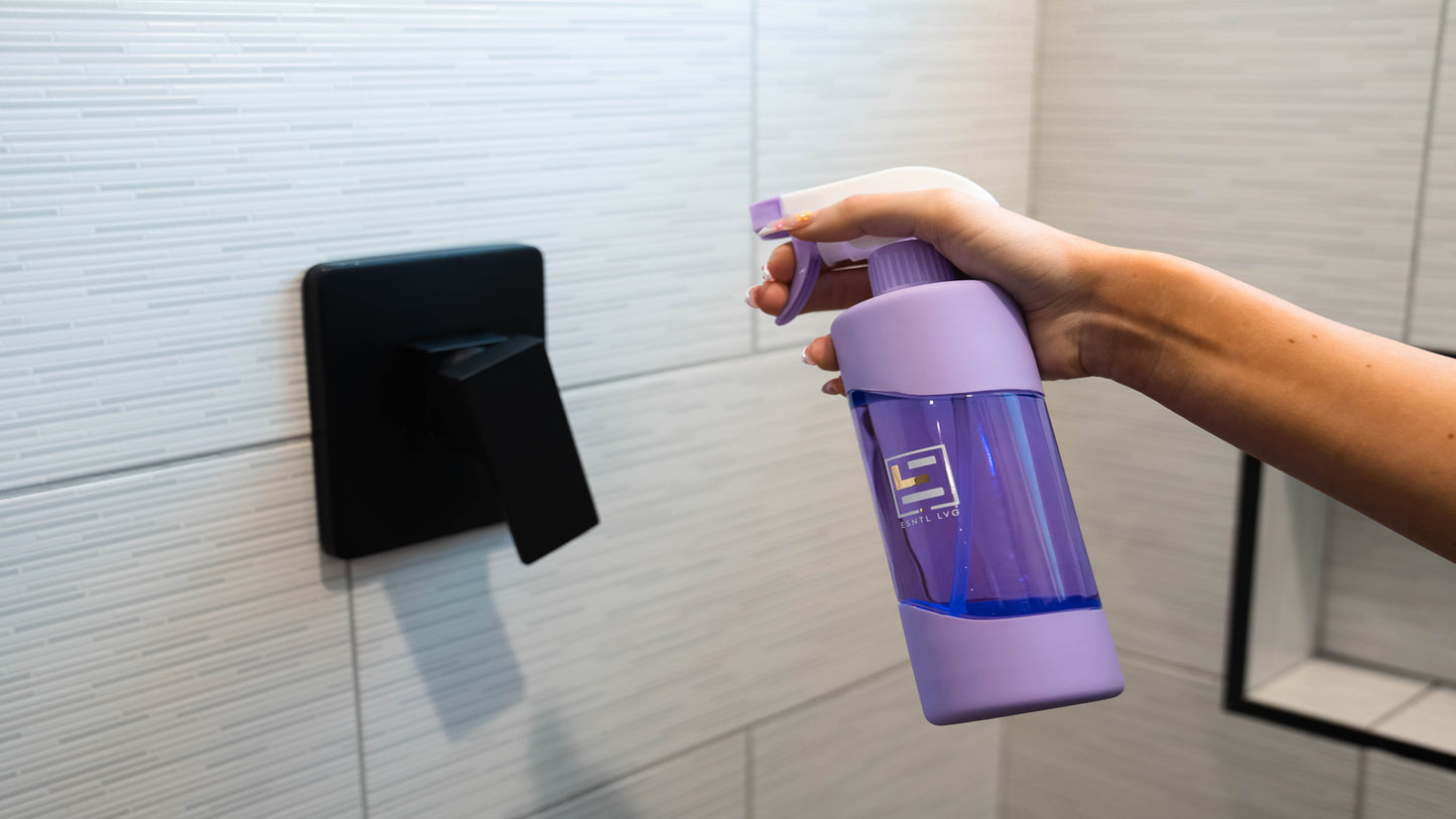 Person using ESNTL LVG eco friendly Restroom Cleaner and Descaler