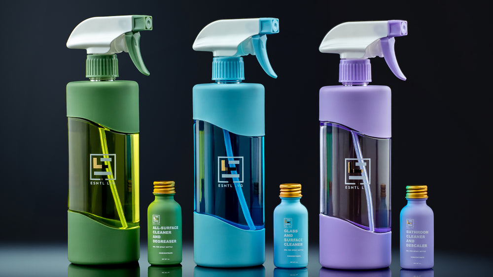 ESNTL LVG reusable glass spray bottles filled with eco friendly cleaning solutions